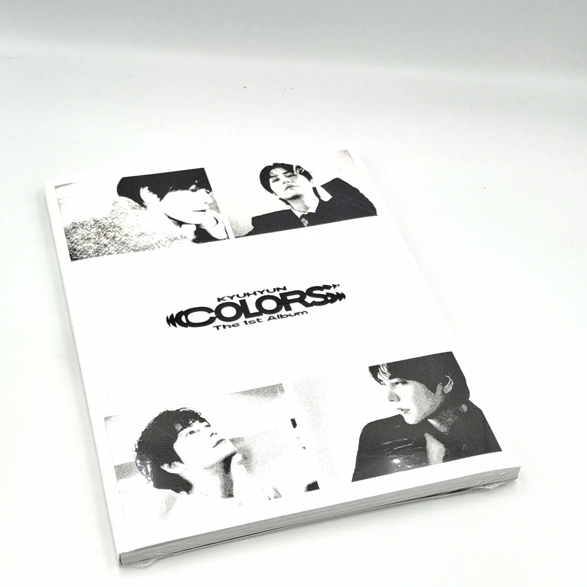 KYUHYUN - COLORS (Photo Book version) (1st Album) front KYUHYUN - COLORS (Photo Book version) (1st Album) front